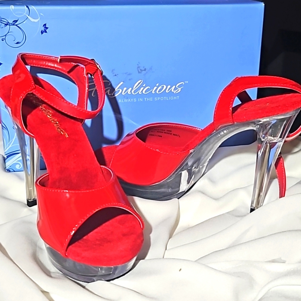 RED cocktail heels with clear bottom. Suede inside, shiny red strap.
